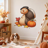 Thanksgiving turtle, orange pumpkin and fall leaves wall sticker above a rug with a small dog.