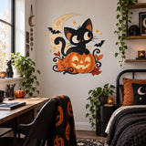 Halloween black cat wall decal beside a writing desk and a black metal bed.
