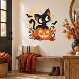 Black cat on a smiling pumpkin wall decal with a crescent moon above a wooden entry bench.