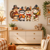 Cartoon Thanksgiving animal group wall sticker above a white dresser with pumpkin decorations in a nursery.