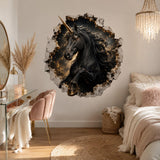 Black unicorn head emerging from a cracked dark stone wall decal above a white vanity and pink chair.