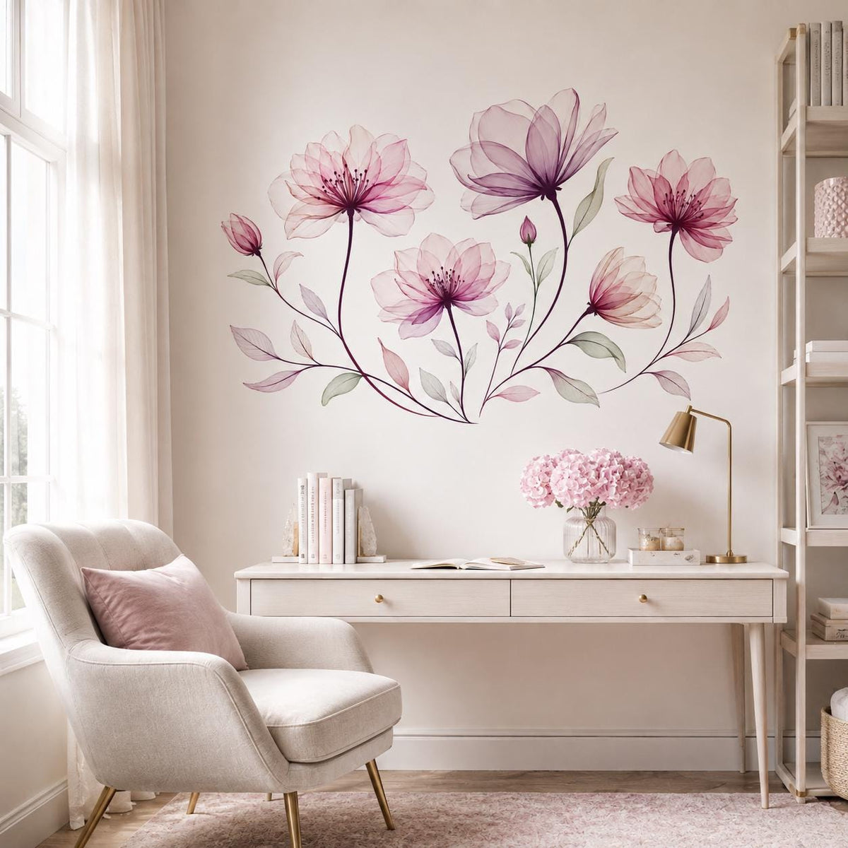 Pink and burgundy botanical wall decal above a white writing desk and cream chair in a home office.