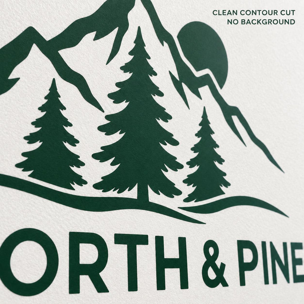 Close-up of the green North & Pine mountain, pine tree and sun logo wall decal showing clean contour-cut vinyl edges.