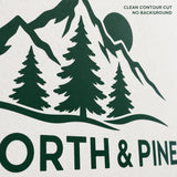 Close-up of the green North & Pine mountain, pine tree and sun logo wall decal showing clean contour-cut vinyl edges.