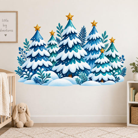 Snowy blue and teal evergreen forest wall decal with gold colored stars, berry branches and a white snowy base above a sofa.
