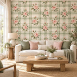 Pink floral wallpaper featuring rose blossoms and leaves across a pale cream plaid design.