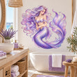Purple mermaid wall decal with flowing violet hair, a curled tail, teal seaweed, bubbles and marine plants.