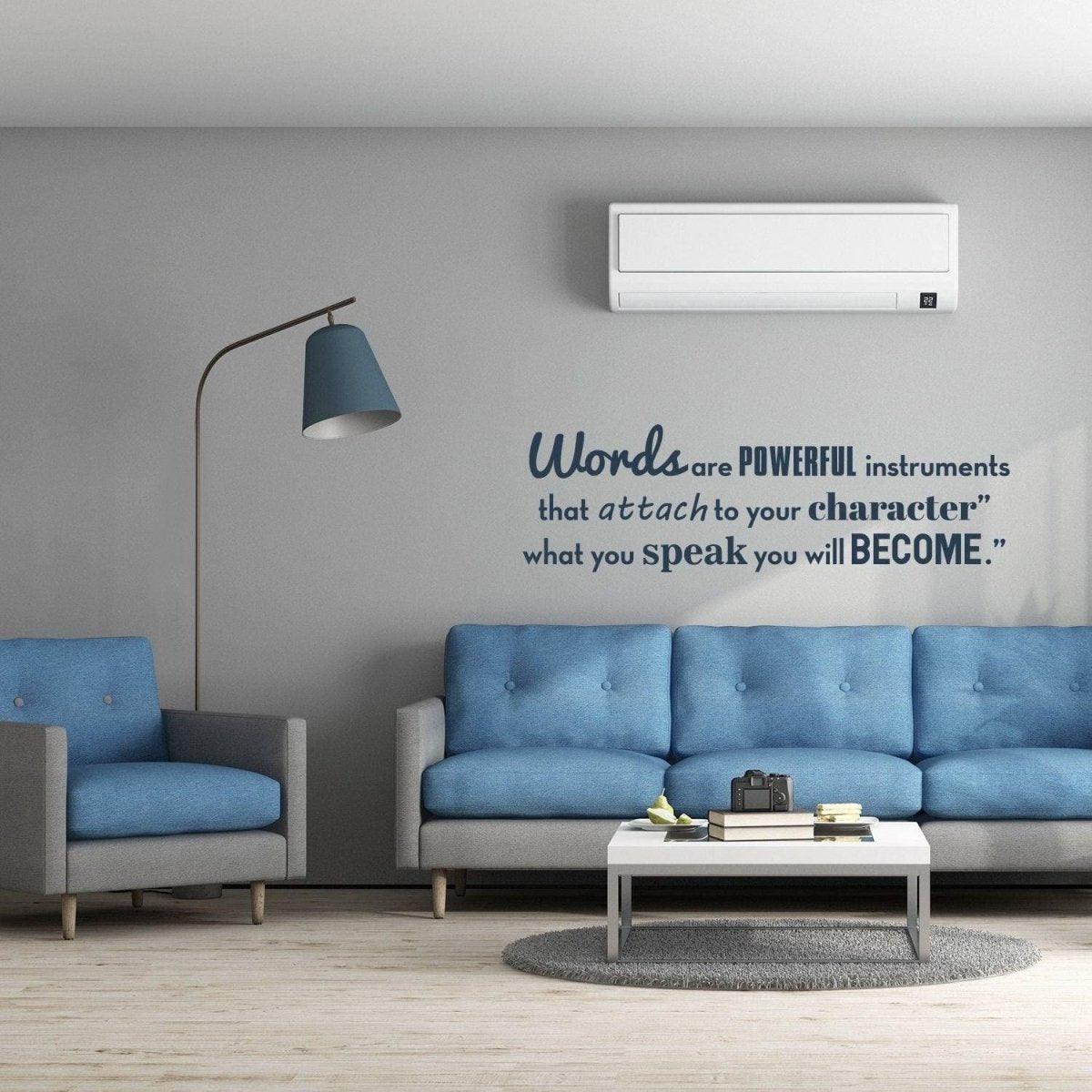 Motivational wall decal featuring the quote about powerful words in a stylish living room setting.