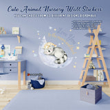Cute animal nursery wall sticker featuring a baby elephant on a moon with stars.