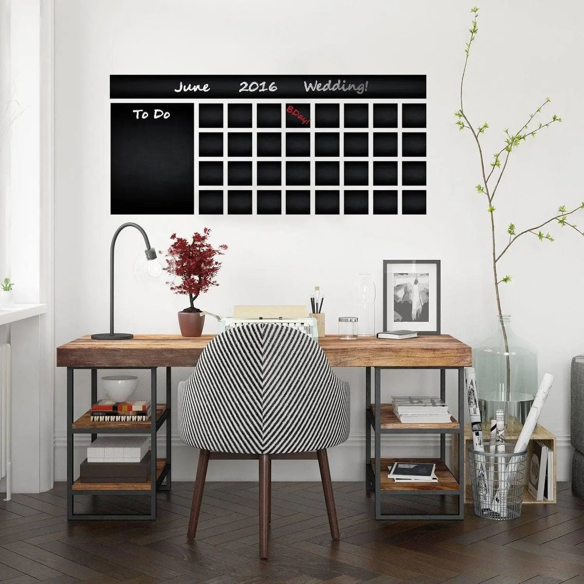 Adhesive chalkboard wall decal with monthly planner for home office organization and event planning.