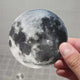 Glow-in-the-dark moon and star ceiling decal set shown in a product video.