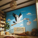 Stork with baby nursery wall decal shown in a product video.