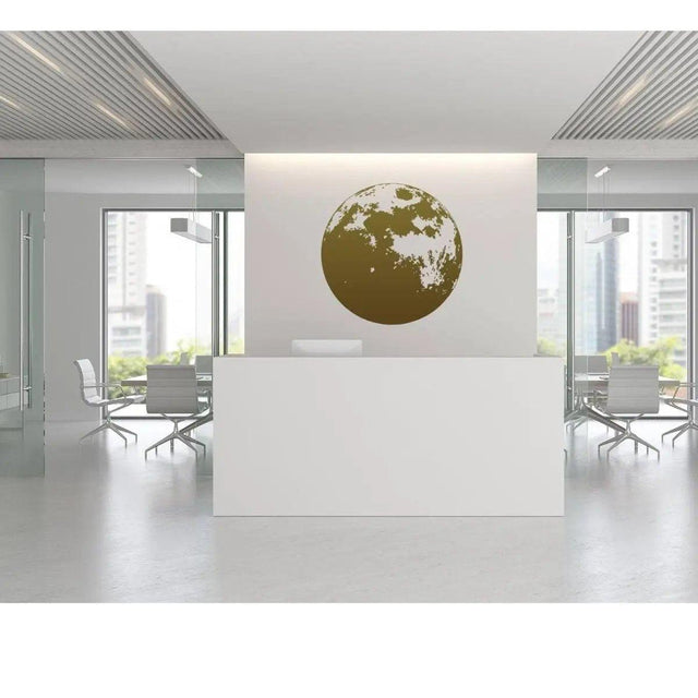 Modern office with a moon phase vinyl wall sticker on a white wall, enhancing workspace decor.