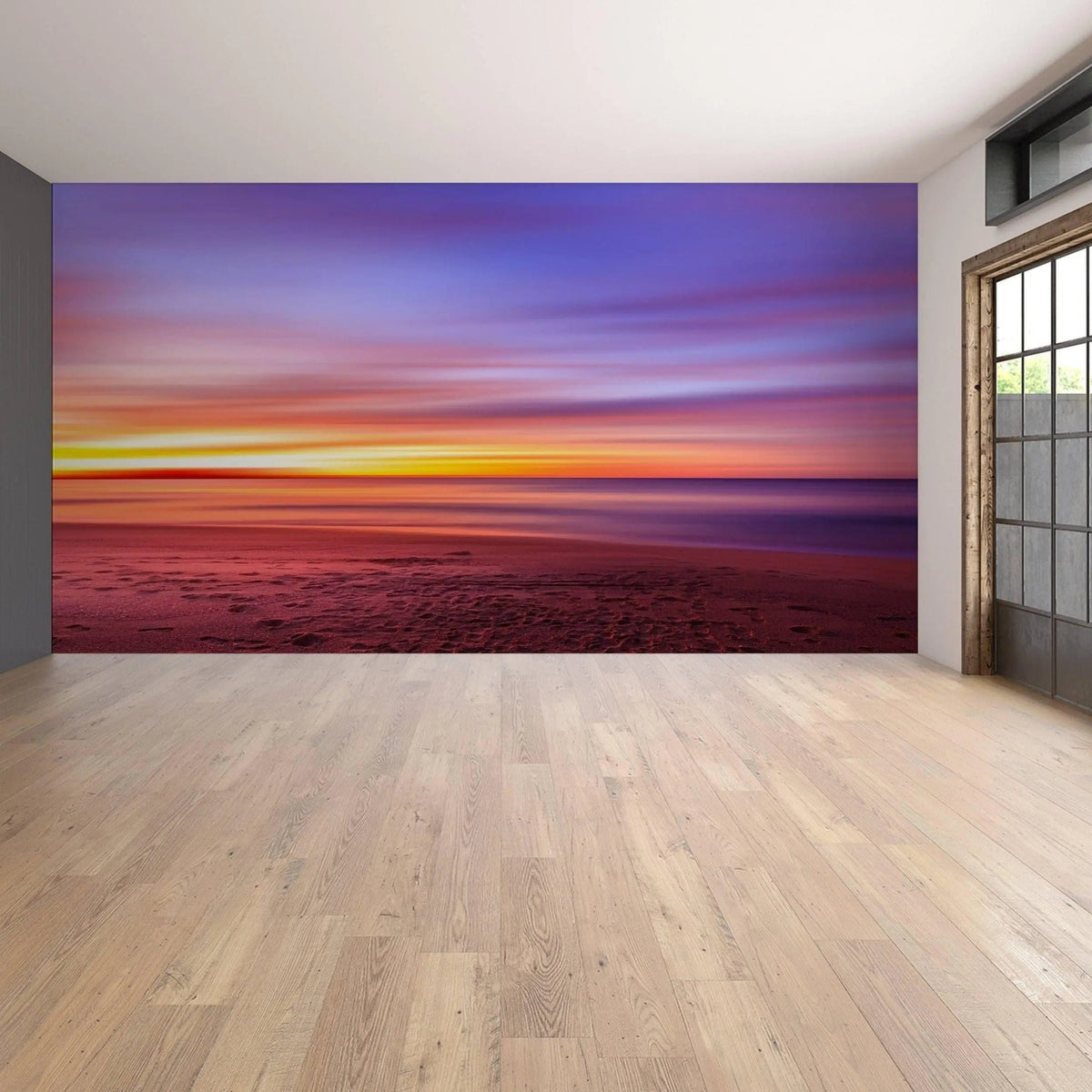 Sunset wall decal showcasing vibrant colors in a serene beach setting.