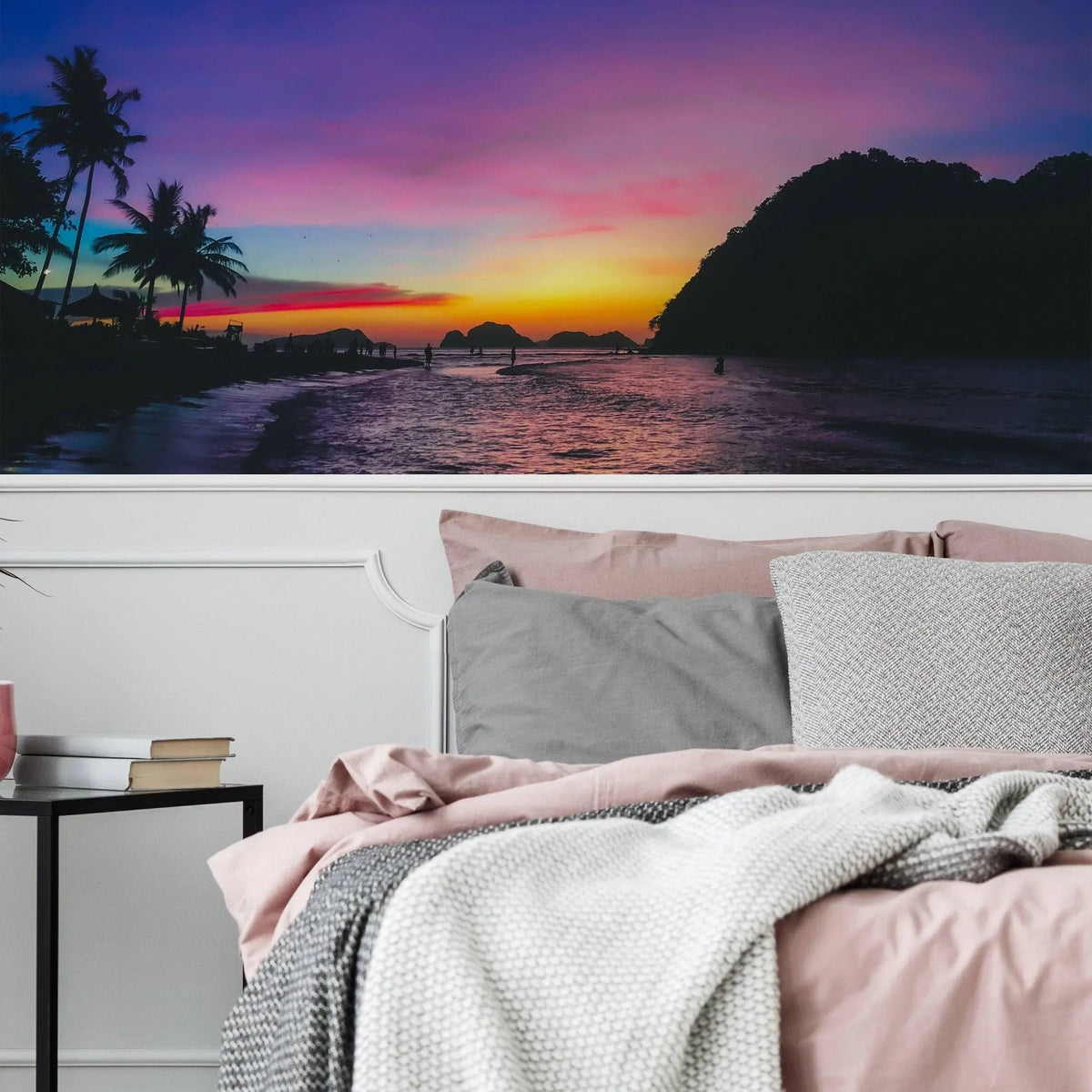 Vibrant urban sunset skyline wall stickers above a cozy bed.