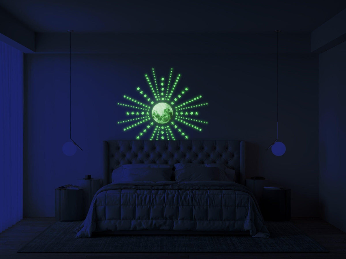 Glowing moon and star wall decals creating a magical starry night in a child's bedroom.