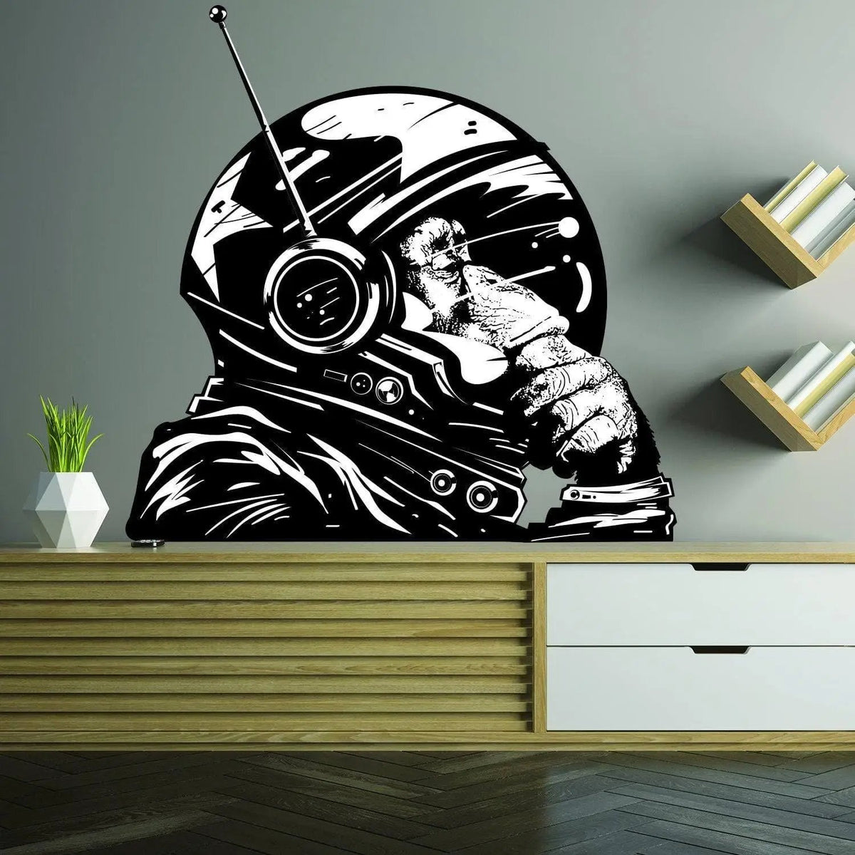 Thoughtful astronaut monkey wall decal for kids' room, featuring detailed design and vibrant black and white colors.