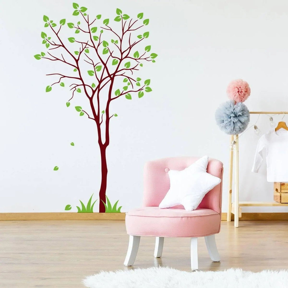 Nature's Serenity vinyl wall decal of a tree with green leaves, enhancing a stylish room decor.