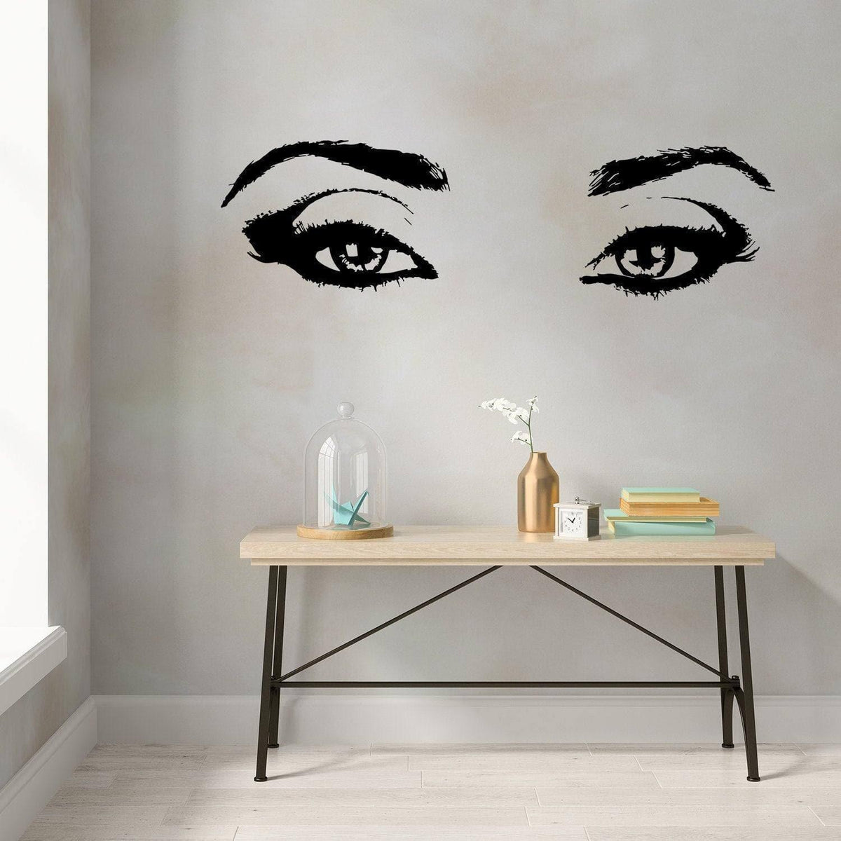 Elegant vinyl wall decal of beautiful eyes with lashes, enhancing interior decor with charm and style.