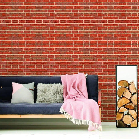 Cozy living room featuring a brick wall, soft pillows, and a pink throw blanket.