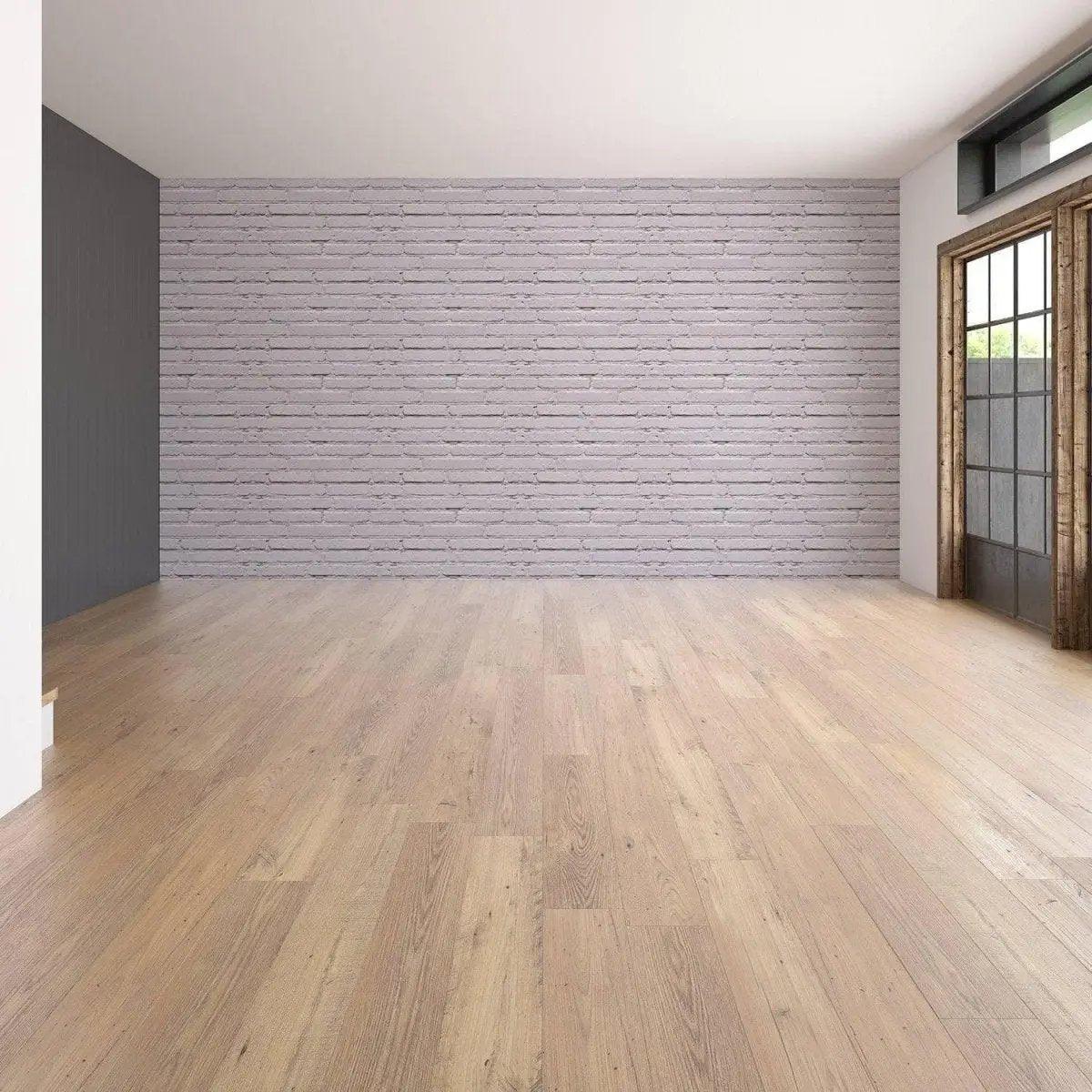 Spacious living room showcasing peel and stick 3D stone wall transformation kit wallpaper on a feature wall.