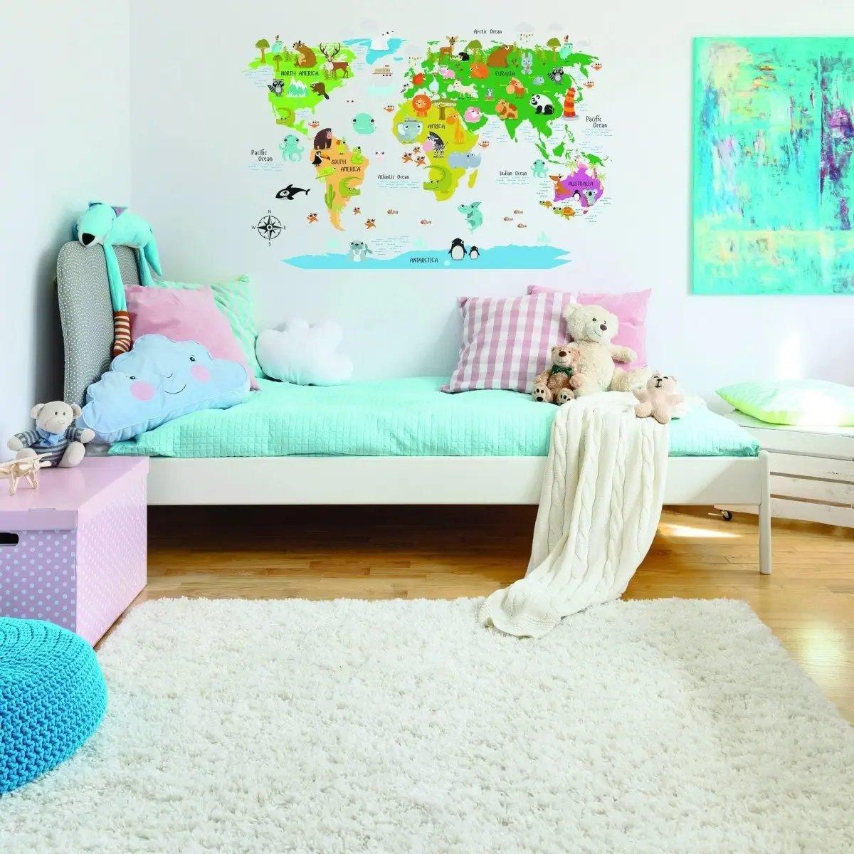 Kids room featuring a colorful world map wall decal.