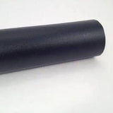 Close-up of a roll of black chalkboard wall sticker.