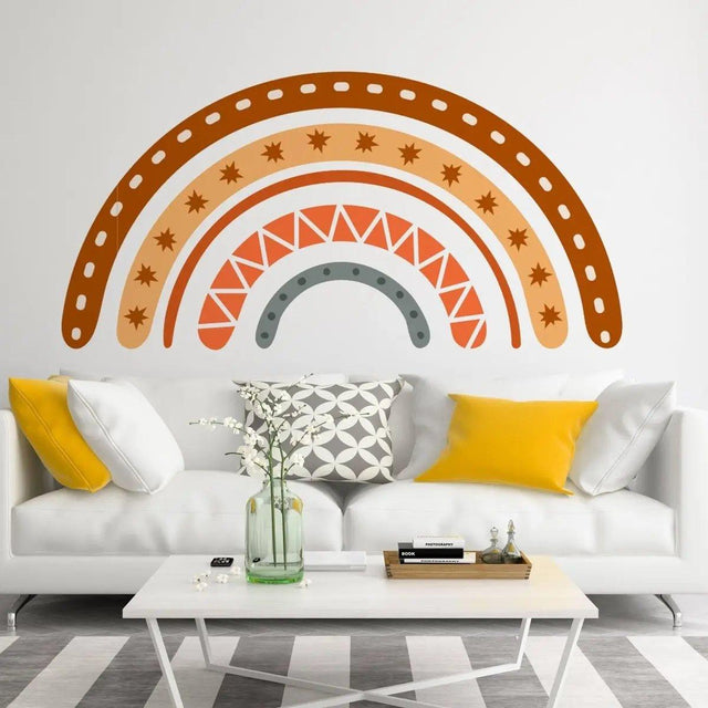 Boho multicolor rainbow wall decal above a modern white sofa, adding a vibrant touch to the decor.