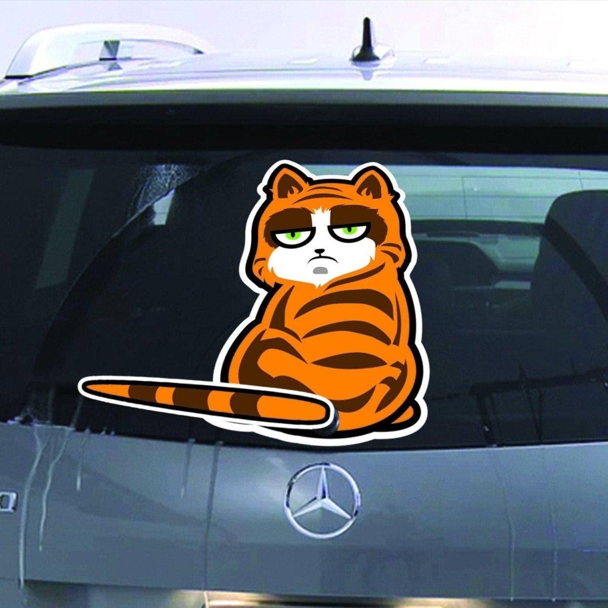 Playful cat wiper sticker decal on a car rear window, showcasing a cute cartoon feline design.