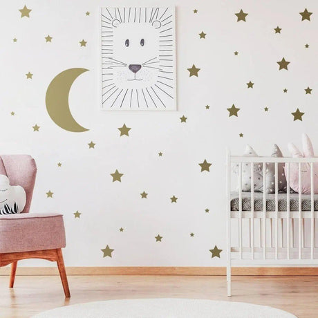 Celestial Dreams wall stickers featuring stars and moon accenting a nursery wall with a crib and cozy decor.