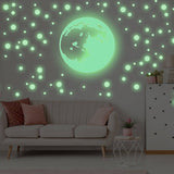 3D celestial glow wall sticker set featuring a glowing moon and round stars in a cozy living room setting.