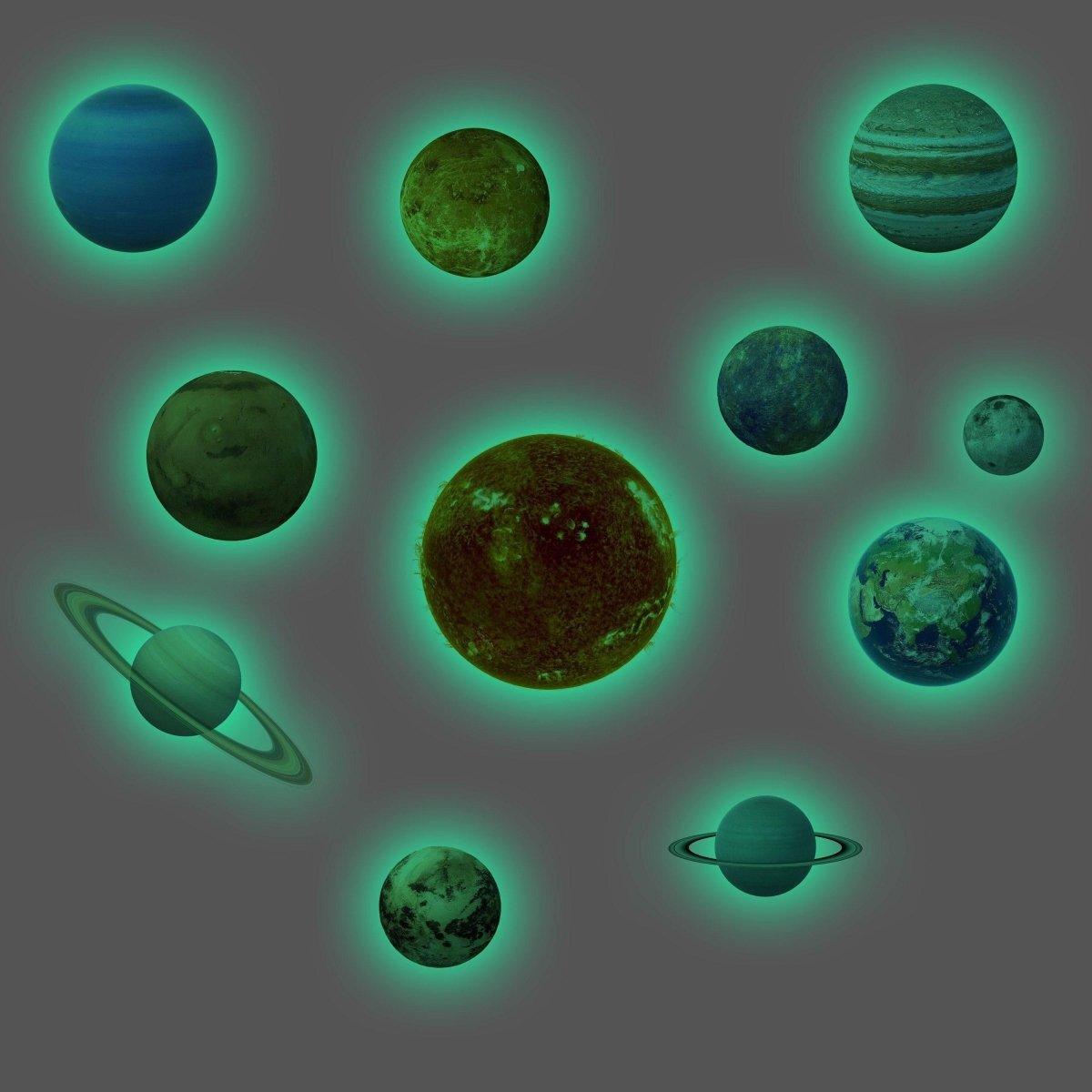 Glow in the dark solar system wall stickers featuring planets and rings.