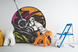 Cosmic Chimp decorative wall decal featuring a space monkey design in a vibrant room setting.