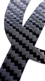 Close-up of personalized carbon fiber letter sticker showcasing its.