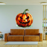 Orange pumpkin face vinyl wall decal displayed above a sofa.