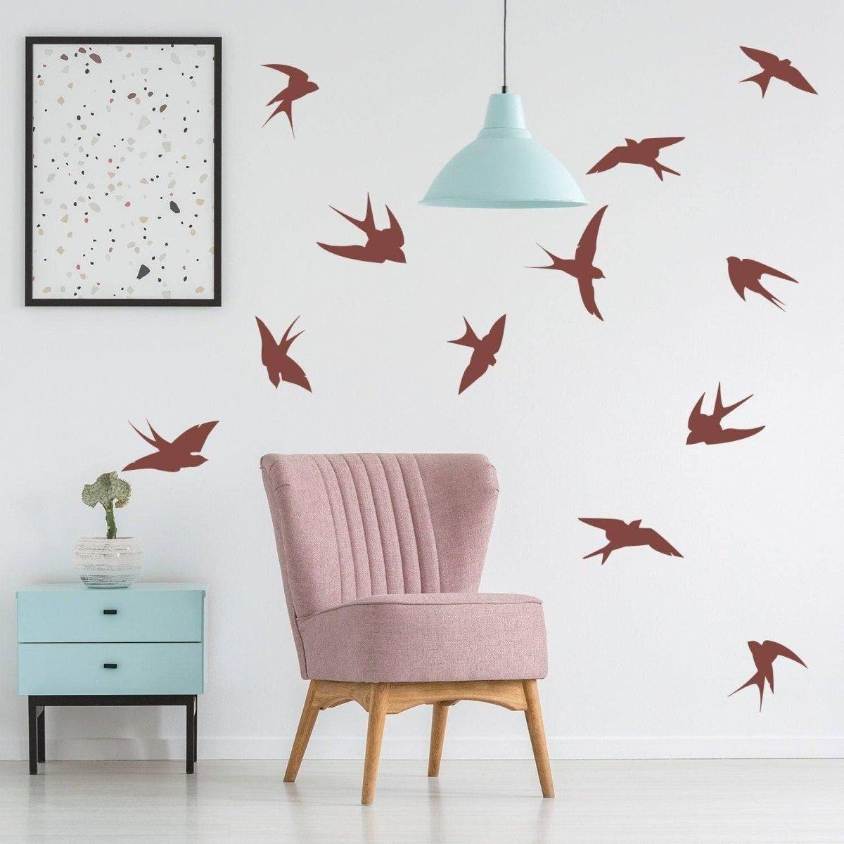Stylish bird themed wall decal sticker set enhancing room decor with flying bird designs and modern chair.