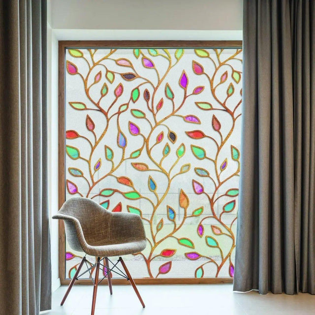 Frosted leaf design privacy window film allowing light, enhancing home elegance with stylish decor.