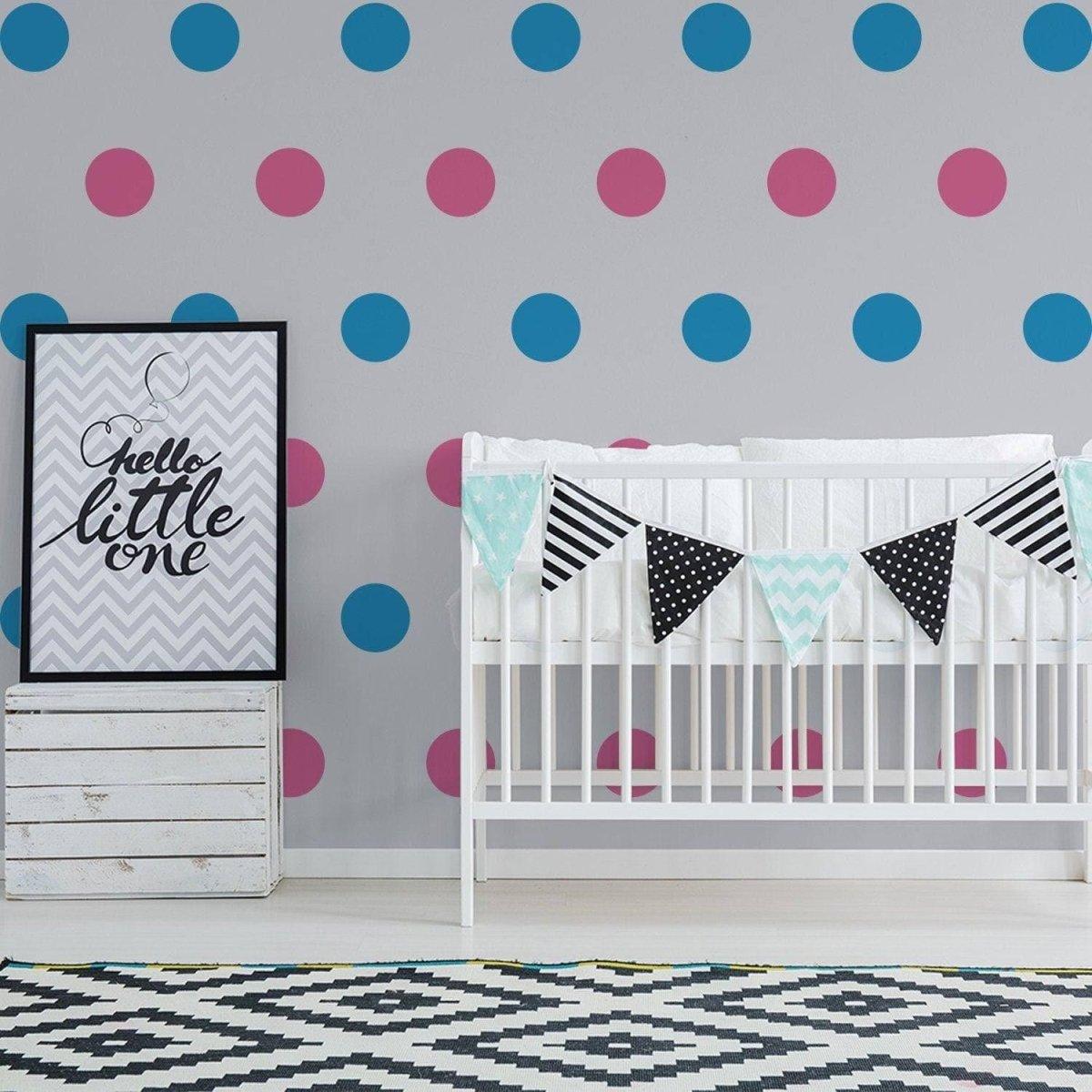 Chic nursery decor with colorful circle wall stickers and a crib, featuring decorative bunting and modern design.