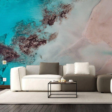 Luxurious marble wall covering in a stylish living room with modern furniture and decor.