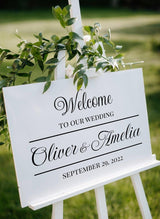 Elegant wedding welcome sign displaying names Oliver and Amelia with date September 29, 2022.