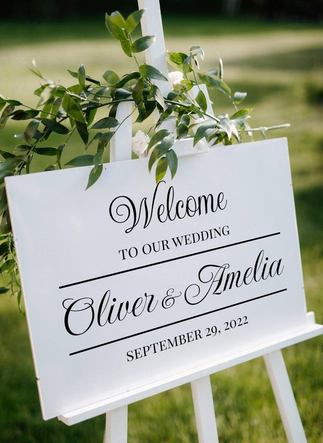 Elegant wedding welcome sign displaying names Oliver and Amelia with date September 29, 2022.