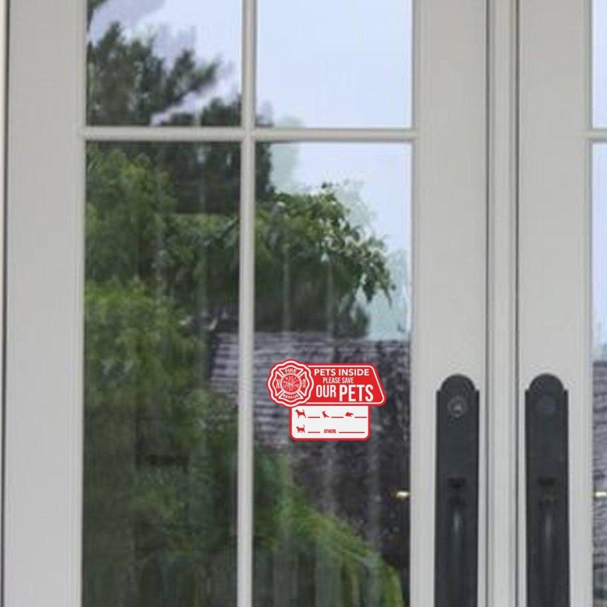 Emergency Pet Alert Cling Sticker displayed on a glass door, indicating pets inside for safety in emergencies.