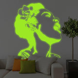 Glow in the dark wall decal of a woman singing, illuminating a modern living room with vibrant colors.