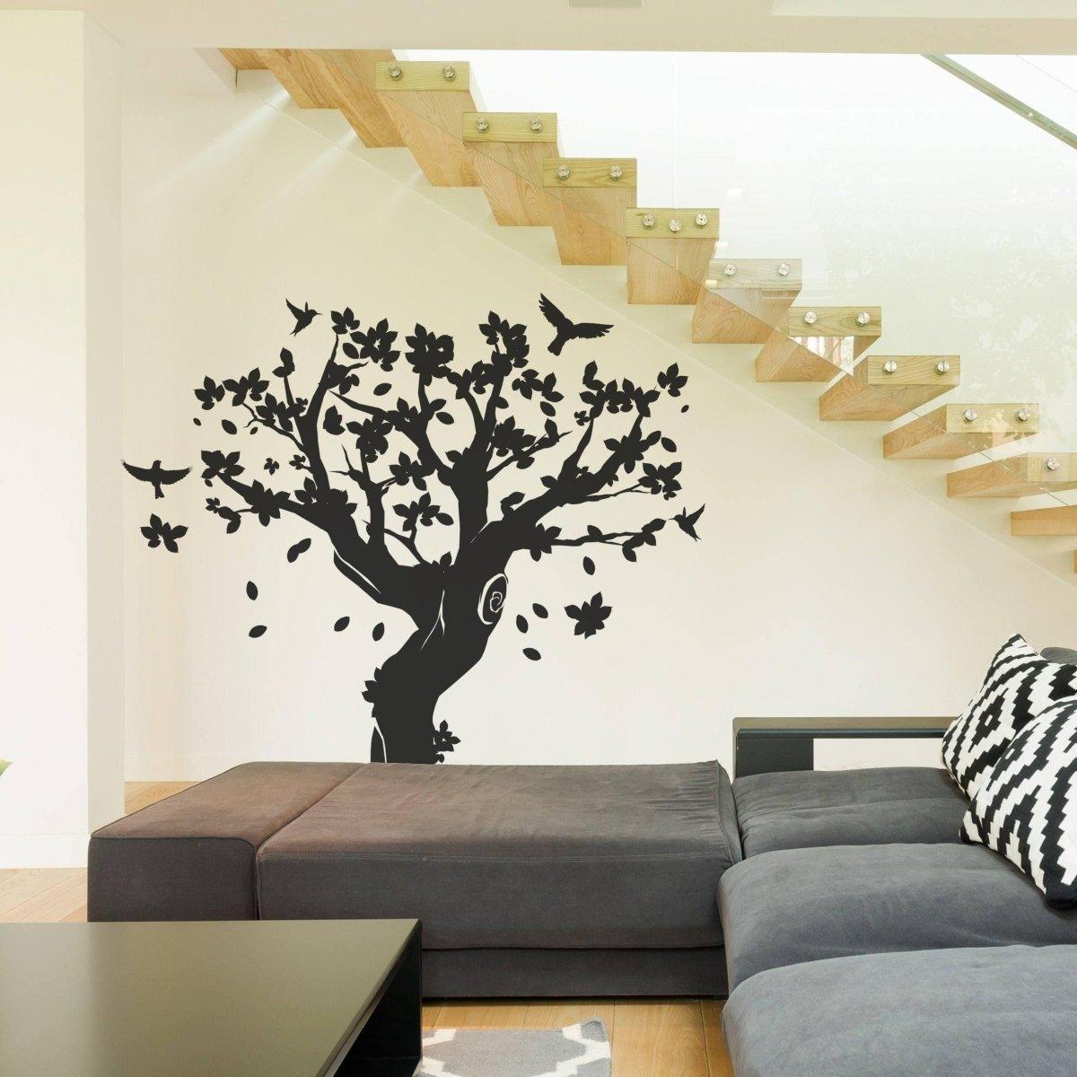 Contemporary tree wall art sticker in a modern living room, adding charm and elegance to the decor.