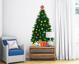 Christmas pine wall decal with colorful ornaments and star, decorating a cozy living room.