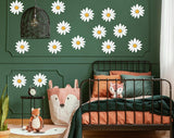 Boho Daisy wall decals in a cozy bedroom with green walls, featuring playful decor and floral designs.