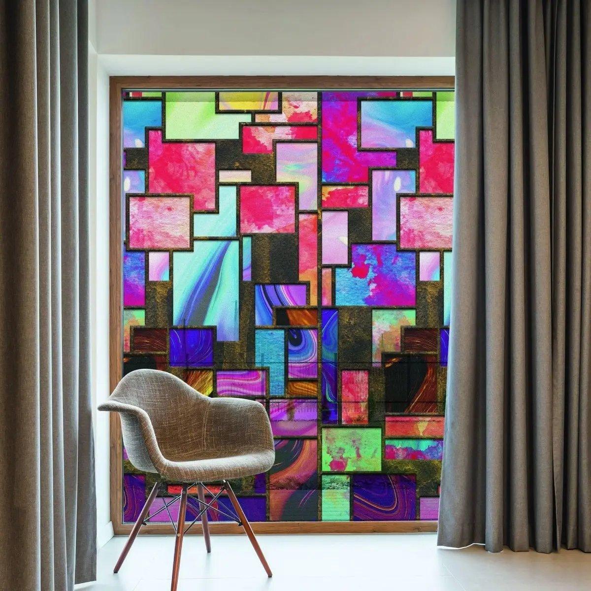 Vibrant frosted window film with colorful geometric patterns enhancing privacy in a stylish room.