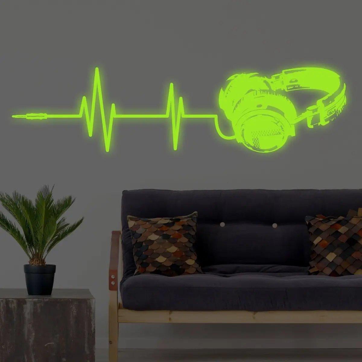 Luminous vinyl wall decal featuring headphone and soundwave design.