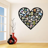 Heart-shaped picture frame wall sticker with multiple photo frames displayed in a stylish room decor.