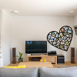 Heart-shaped photo frame wall sticker showcasing cherished memories in a stylish living room.